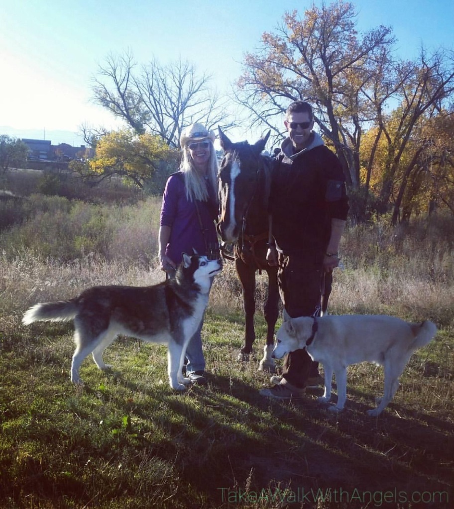 Husky Rescues and their humans, Jeannie Marie Blaha and BJ Bronstad, loving their meetups with their Horse friend, Chico, Colorado